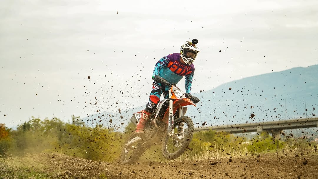 Antonio Damjanovski full throttle on dirt curve